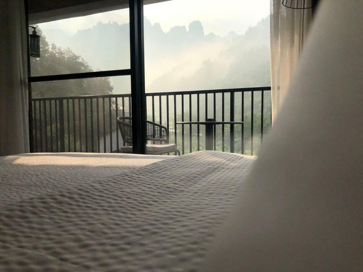 Whispering Mountains Boutique Hotel Чжанцзяцзе Экстерьер фото