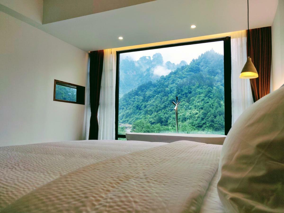 Whispering Mountains Boutique Hotel Чжанцзяцзе Экстерьер фото